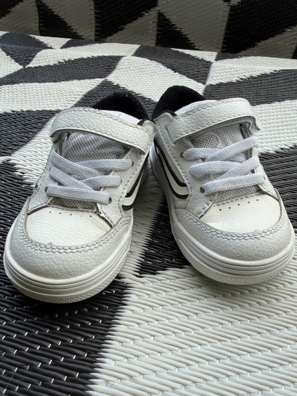 Vans Kids White Sneakers with Black Stripe